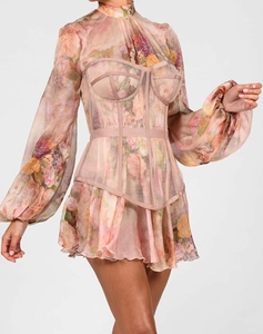 Detailed view of pink floral mesh mini dress featuring a structured corset waist design