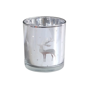 Silver glass candle holder with reindeer and star patterns on a clean white background