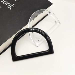 Macro shot of D-shaped resin handles in black and transparent for DIY handbags