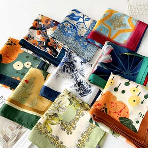 Collection of colorful 70cm satin square silk scarves with floral and geometric prints