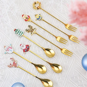 8-piece gold stainless steel Christmas spoons and forks set with festive cartoon charms
