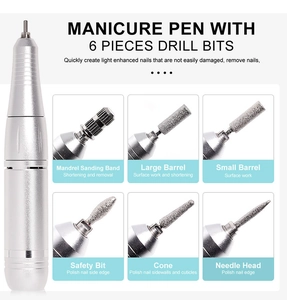 Detail view of electric manicure pen with six professional metal drill bits for nail care