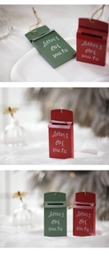 Detail of red and green vintage metal mailboxes with Letters for Santa inscription