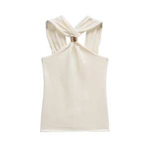 Close-up of white halter knit top featuring a signature gold metal ring detail at the neck