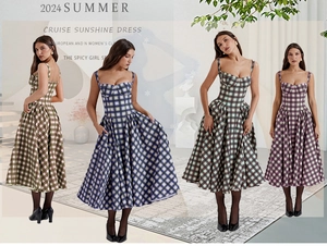 Detail view of plaid sun dresses featuring spaghetti straps and full flared skirts in summer