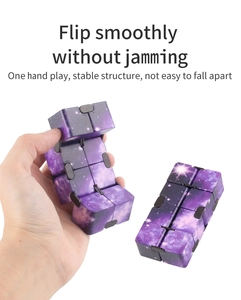 Detail of purple galaxy infinity cube showing smooth flip mechanics and stable structure
