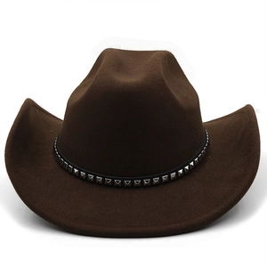 Detail of dark brown wool felt cowboy hat with silver studded black leather band