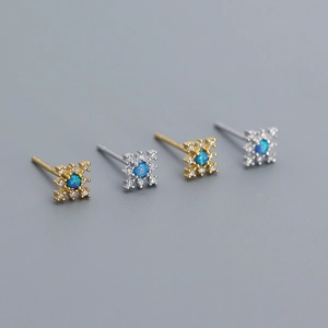 Elegant s925 silver opal stud earrings with gold and silver accents and diamond halo