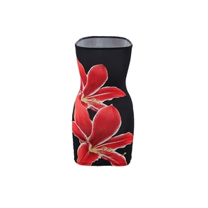 Detailed view of women's strapless bodycon mini dress with bold red flower prints