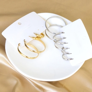 Polished stainless steel hoop earrings in gold and silver variety pack of various sizes