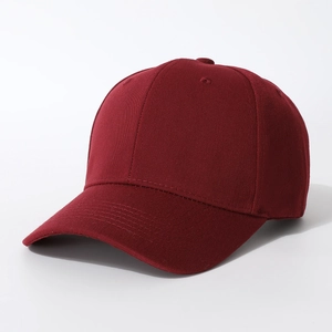 Detailed close-up of dark red cotton baseball cap showing classic six-panel design and curved brim