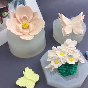 Silicone flower and butterfly molds for fondant crafts with pink flower and basket outcome