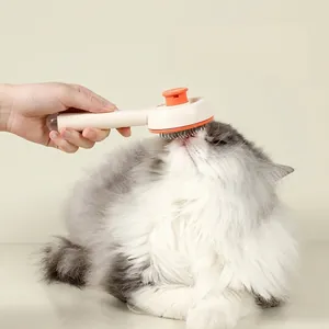 Brosse autonettoyante pour chats et chiens éliminant les poils morts d'un chat