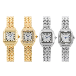 Detailed comparison of gold and silver square quartz watches with Roman numeral dials