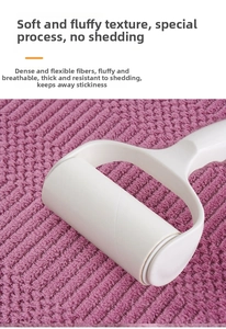 Close-up of soft purple coral fleece towel showing breathable texture and plush density