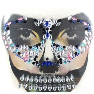 Skull-shaped facial rhinestone stickers in blue and pink for Halloween party makeup