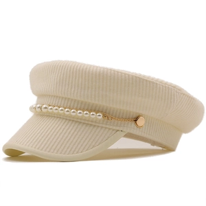Elegant cream corduroy newsboy cap with decorative pearl chain and golden side buttons