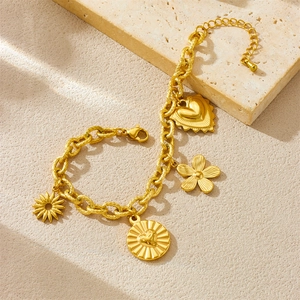 Gold-plated stainless steel chain bracelet featuring sun, heart, and flower charms on stone