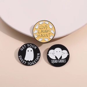 Set of 3 round Halloween enamel ghost pins with creative English puns on beige background