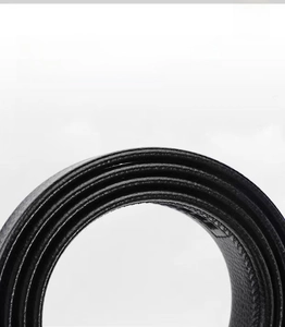 Macro shot of black lychee grain leather belt showing durable folded edge craftsmanship