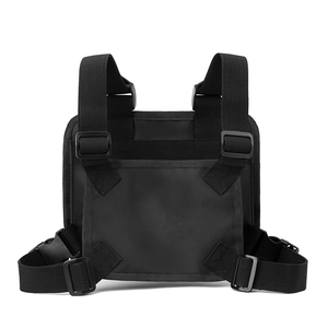 Front detail of black tactical chest bag showing durable nylon and plastic buckles
