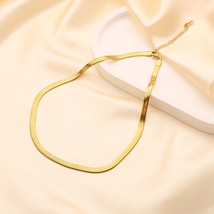 Detail of gold-plated stainless steel snake bone chain with adjustable clasp mechanism