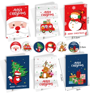 Detail view of 6 Christmas cards and stickers with Merry Christmas greeting and size specs