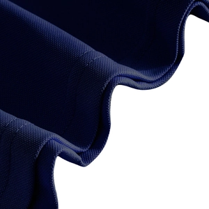 Close-up of dark blue pique fabric showing breathable mesh texture and premium sewing quality