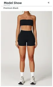 Close-up of premium black brushed yoga set featuring a bandeau top and high-waist shorts