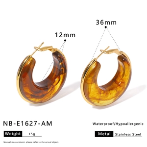 Detail view of amber resin hoop earrings with stainless steel dimensions and specs