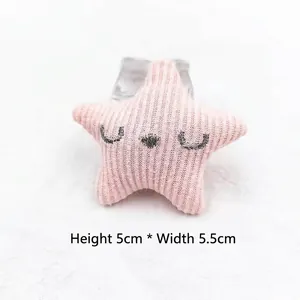 Pink plush star accessory with closed eye embroidery showing dimensions 5cm by 5.5cm
