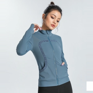 Slim fit women's yoga jacket in slate blue with long sleeves and thumbholes
