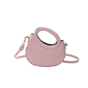 Pink semi-circle handbag with vertical striped embossing and golden metal hardware
