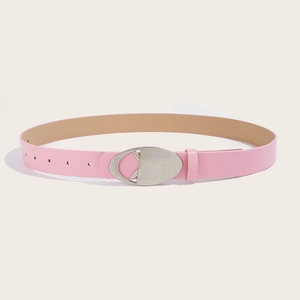 Detail of pink leather belt featuring a polished silver oval buckle and beige inner lining