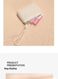 Macro view of woven straw coin purse with honeycomb texture and wristlet strap