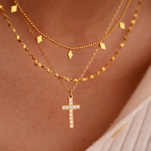 Elegant gold layered necklace set with diamond cross and rhombus pendants for women