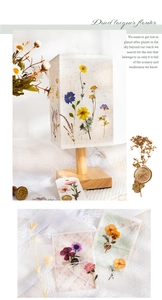 Detailed close-up of a floral fabric lampshade with dried pressed flower stationery set