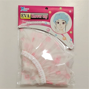 Waterproof EVA shower cap with pink floral pattern and lace trim in retail packaging