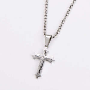 Detailed view of punk style stainless steel box chain necklace with cross pendant