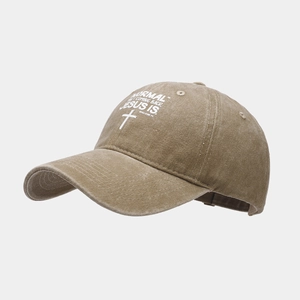 Close-up of vintage washed cotton baseball cap with white cross embroidery and text detail