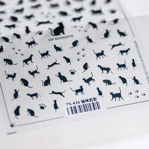 Self-adhesive 5D nail art stickers featuring black cat silhouette and paw print designs