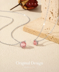 Detail view of S925 sterling silver necklaces featuring rose-cut pink gemstone pendants