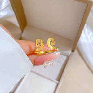 Close-up of golden Sun Wukong style adjustable open ring made of durable titanium steel