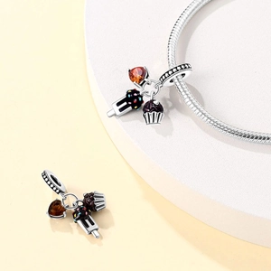 Silver bracelet with heart gemstone, chocolate cake and popsicle food charms