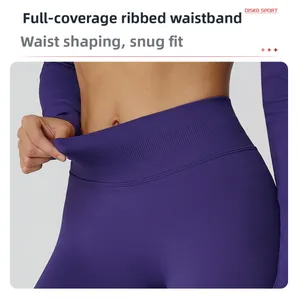 Close-up of high-elasticity ribbed waistband on purple yoga leggings showing stretch