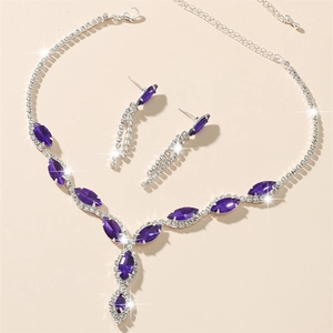 Sparkling silver bridal jewelry set with marquise purple crystals and necklace earrings