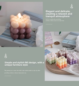 Detailed view of bubble cube scented candles with elegant gradient colors and ribbon deco