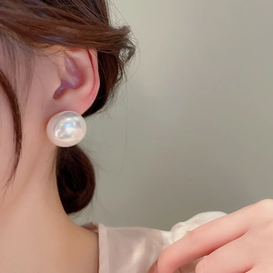 Elegant large white pearl stud earrings for women with a minimalist round geometry style