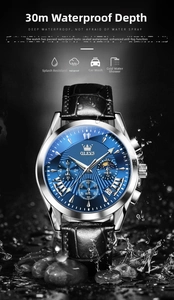 Detail of blue dial quartz watch with chronograph sub-dials and water splash effect