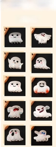 Detail of white PVC ghost claw clips with cute cartoon facial expressions in a grid